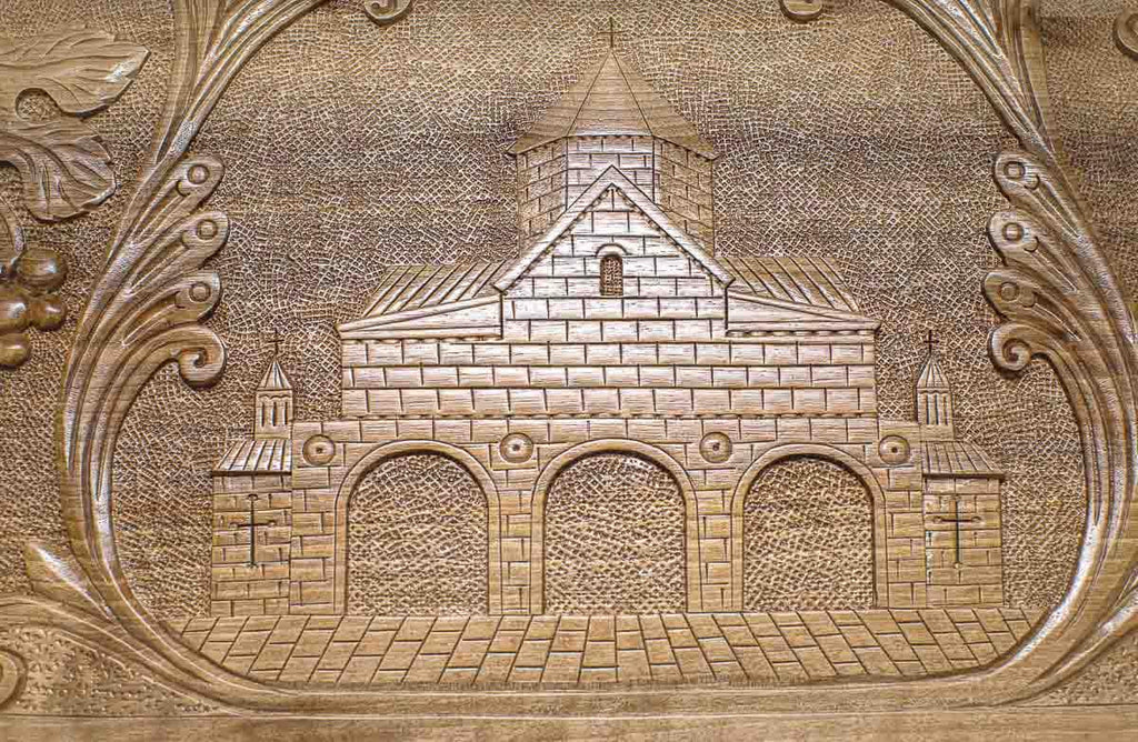The backgammon board opened to show the wooden playing surface