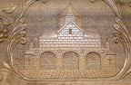 The backgammon board opened to show the wooden playing surface