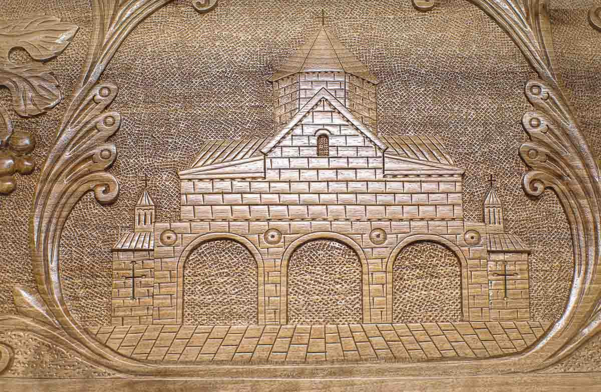 The backgammon board opened to show the wooden playing surface