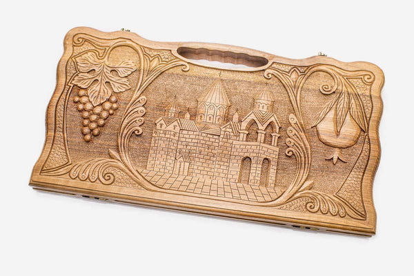 Carved walnut backgammon board with Etchmiadzin Cathedral, propped open