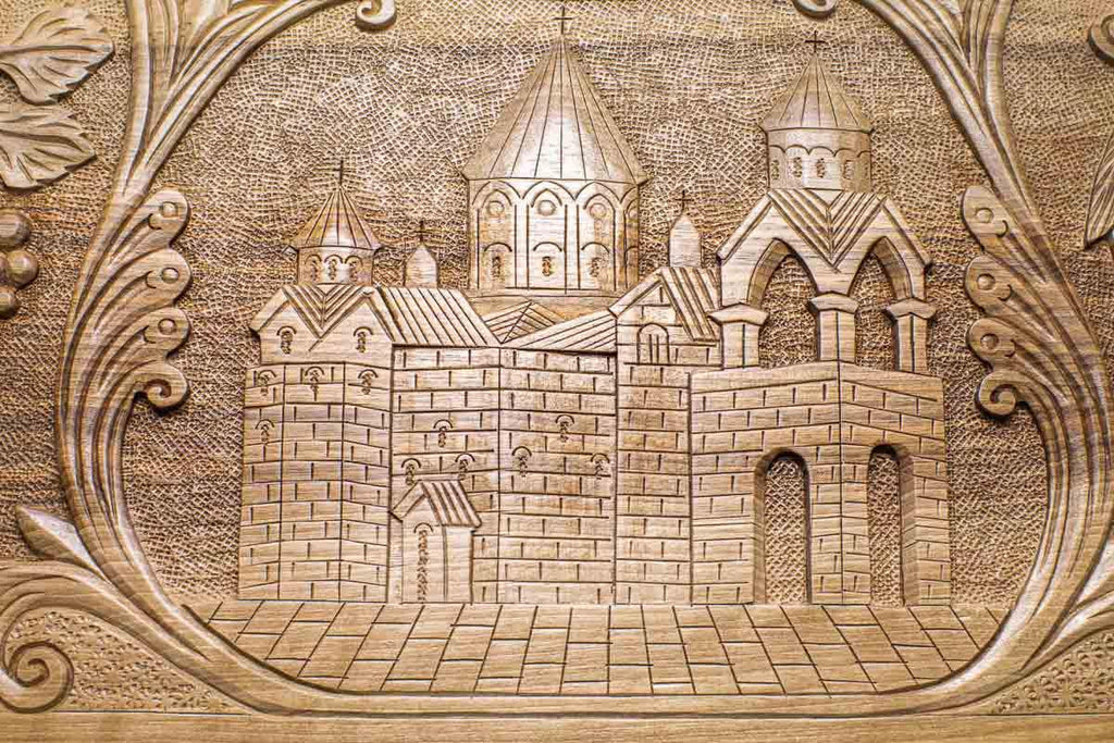 The backgammon board opened to show the wooden playing surface