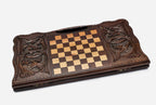 Angled view of the floral scrollwork ornament carved backgammon board