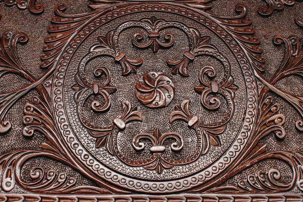 The backgammon board opened to show the wooden playing surface