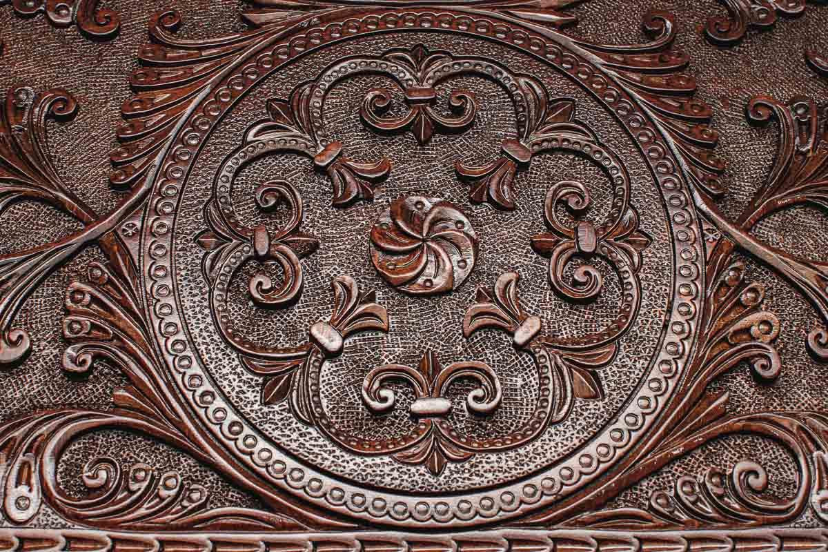 The backgammon board opened to show the wooden playing surface