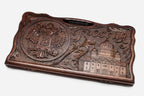 Carved beechwood backgammon board with the Russian coat of arms, name and a cathedral, propped open