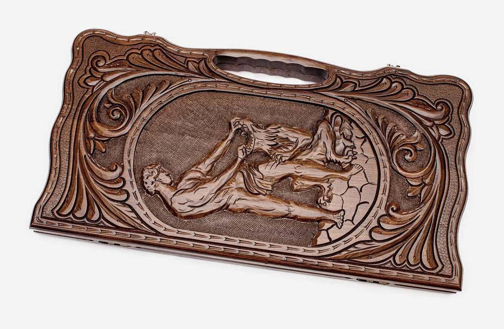 Carved beechwood backgammon board with Samson defeating the lion, propped open