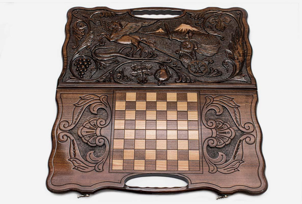 The backgammon board opened to show the wooden playing surface