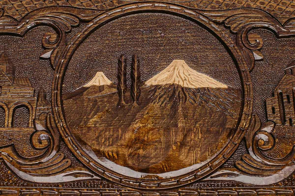 The backgammon board opened to show the wooden playing surface