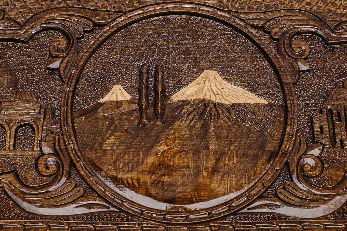 The backgammon board opened to show the wooden playing surface
