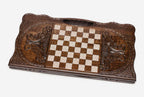 Angled view of the Mount Ararat triptych carved backgammon board