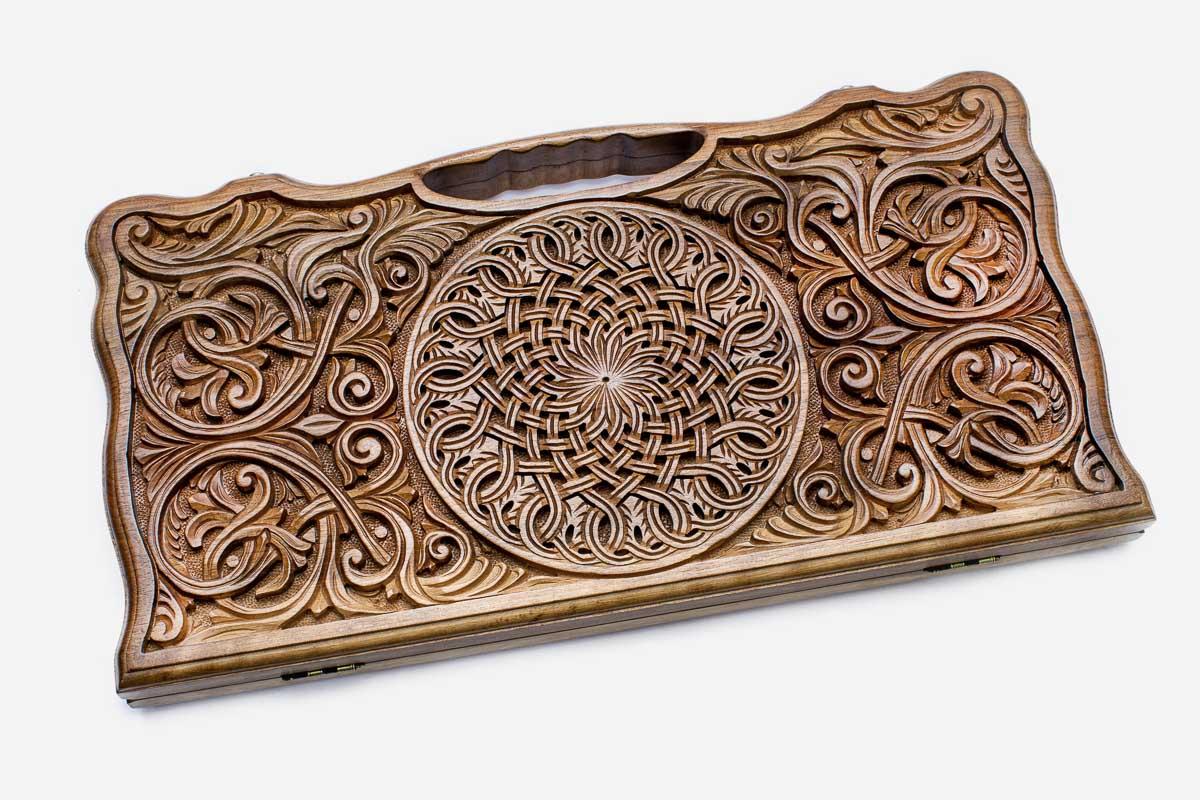 Angled view of the blooming ornament master walnut backgammon board