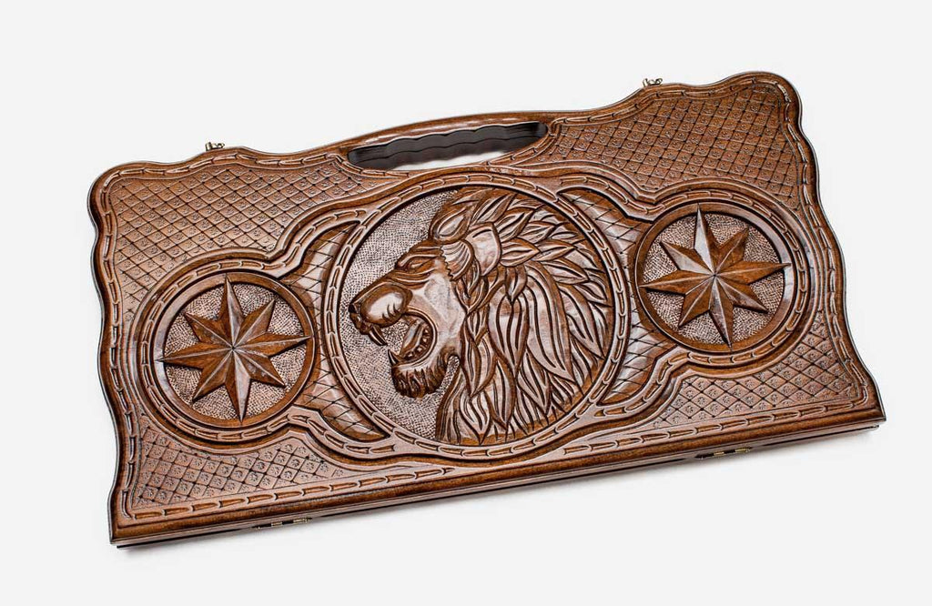 Angled view of the wolf, lion and octagon carved backgammon board