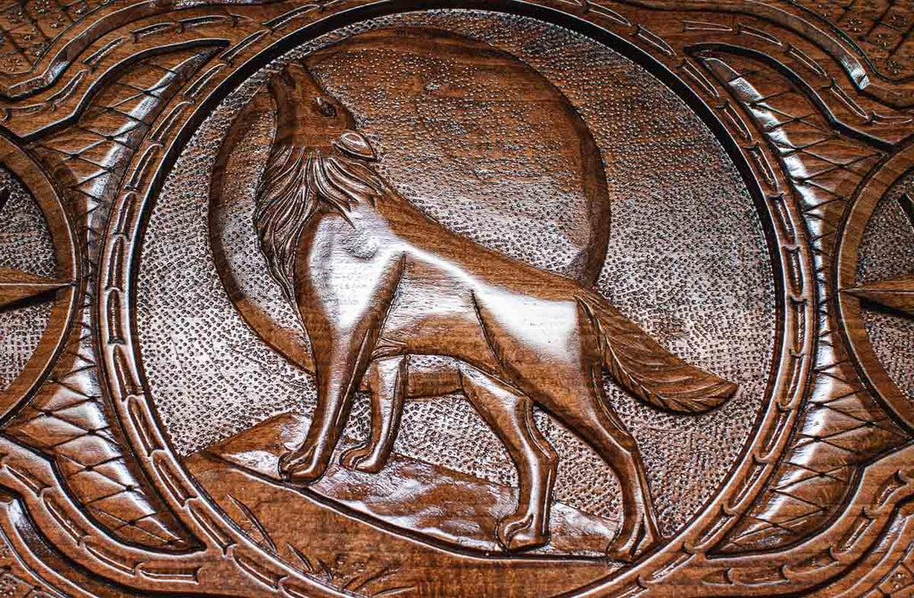 The backgammon board opened to show the wooden playing surface