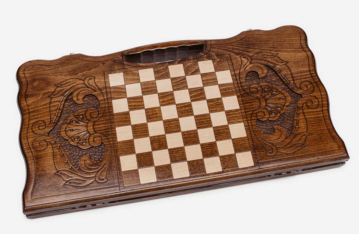 Angled view of the lone wolf carved backgammon board