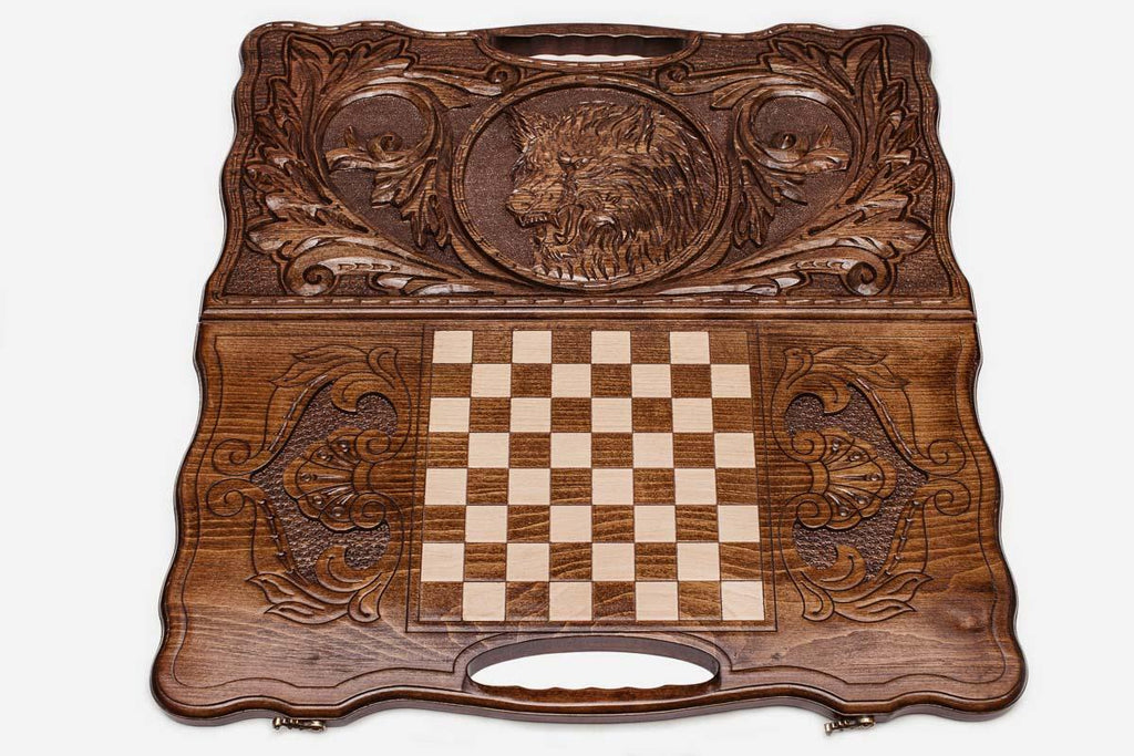 Detail of the scrollwork framing the carved wolf