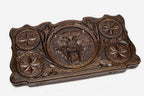 Lone wolf carved on the walnut backgammon board face