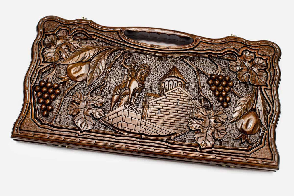 Carved beechwood backgammon board with King Vakhtang Gorgasali and a carry handle, propped open