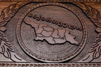 The backgammon board opened to show the wooden playing surface
