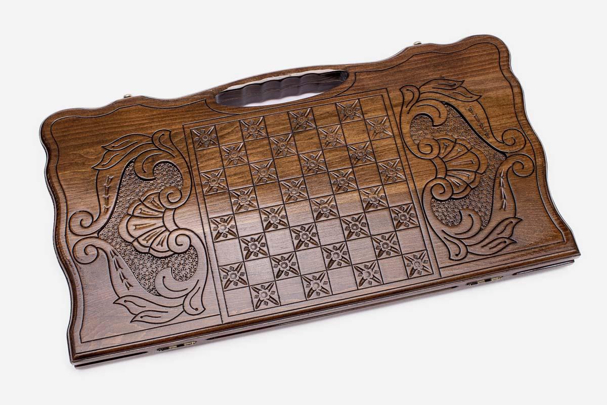 Angled view of the striding lion carved backgammon board