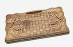 Angled view of the Ararat and Khor Virap grapevine walnut backgammon board