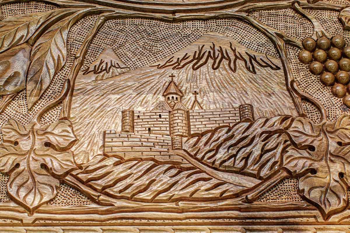 The backgammon board opened to show the wooden playing surface
