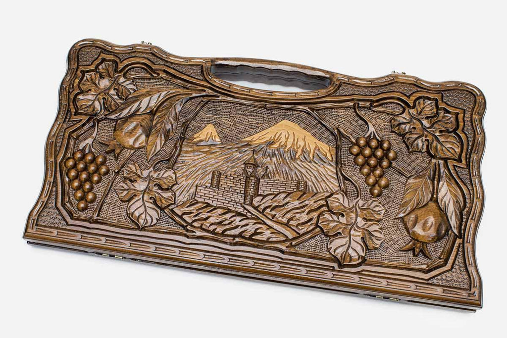 Carved beechwood backgammon board with Mount Ararat, a monastery, grapes and pomegranates, propped open