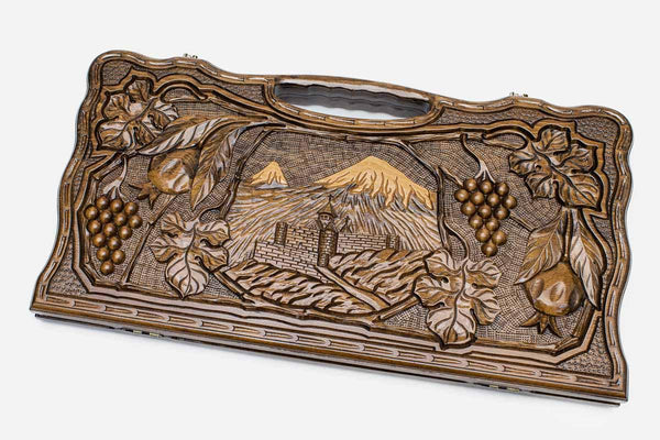 Carved beechwood backgammon board with Mount Ararat, a monastery, grapes and pomegranates, propped open