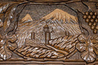 The backgammon board opened to show the wooden playing surface