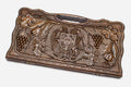 Carved beechwood backgammon board with the Armenian coat of arms and grapevines, propped open