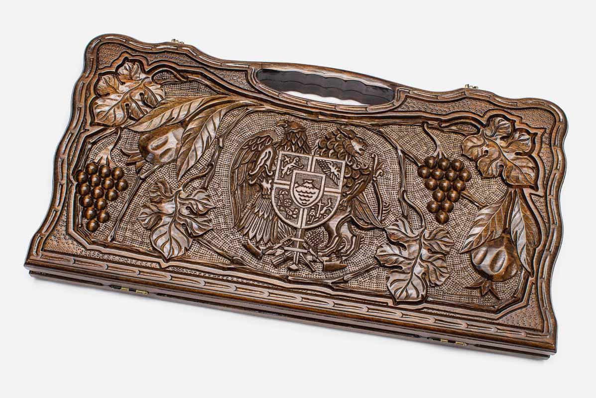 Carved beechwood backgammon board with the Armenian coat of arms and grapevines, propped open