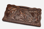 Carved beechwood backgammon board with David of Sasun on horseback amid grapes, propped open