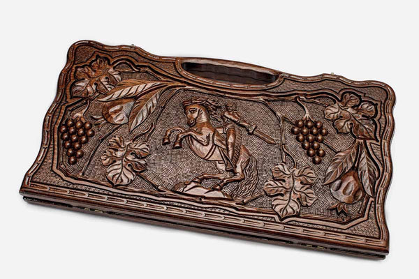 Carved beechwood backgammon board with David of Sasun on horseback amid grapes, propped open