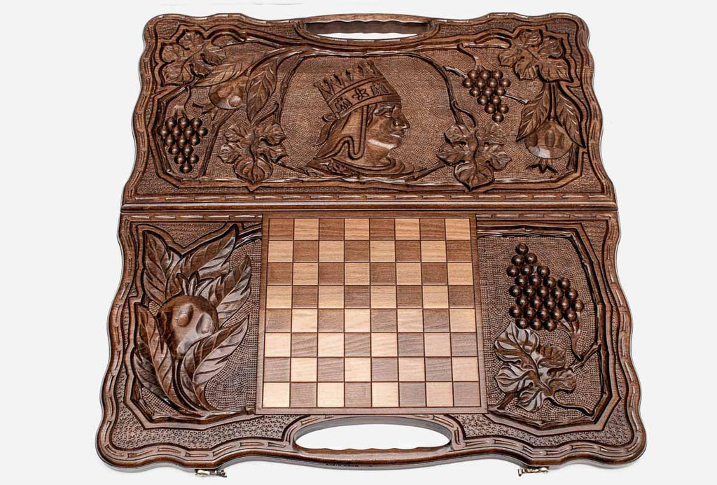 Detail of the scrollwork framing the carved king