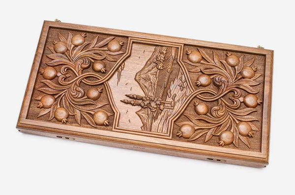 Master-carved walnut backgammon board with Mount Ararat and pomegranate branches, propped open