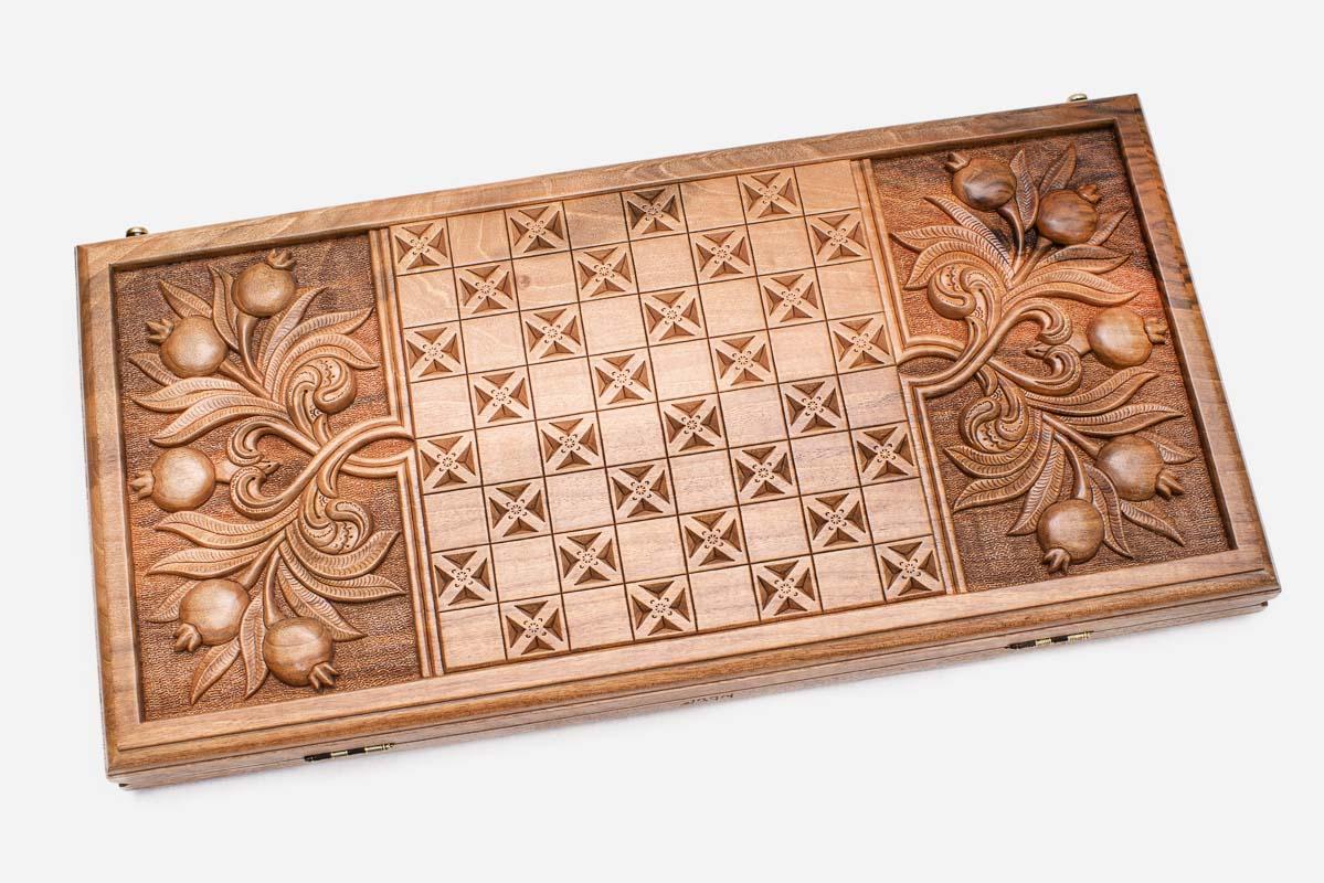 Angled view of the Ararat and pomegranate master walnut backgammon board
