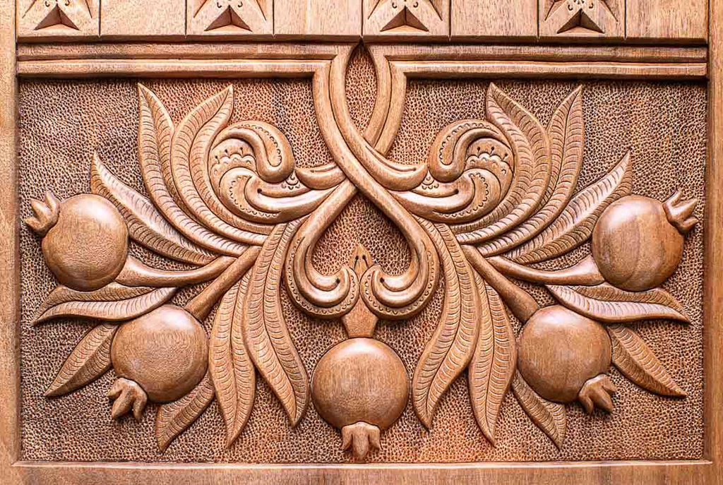 The backgammon board opened to show the wooden playing surface
