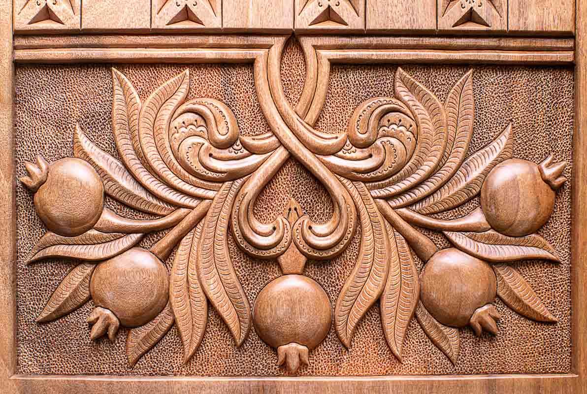 The backgammon board opened to show the wooden playing surface