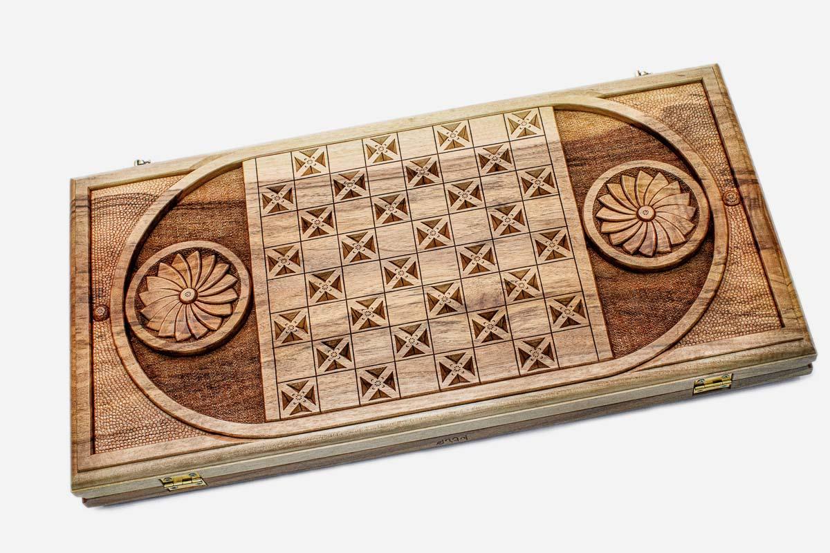 Angled view of the oval Mount Ararat master walnut backgammon board