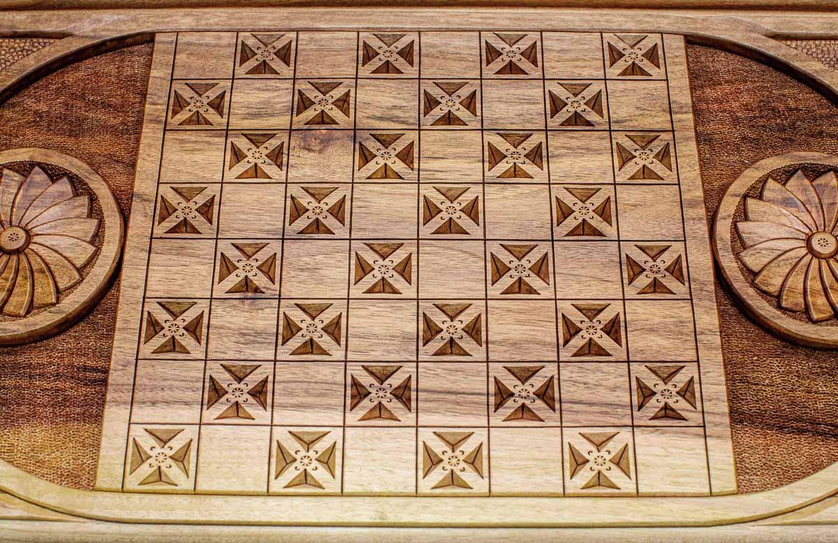 Side view of the folded board with its carry handle