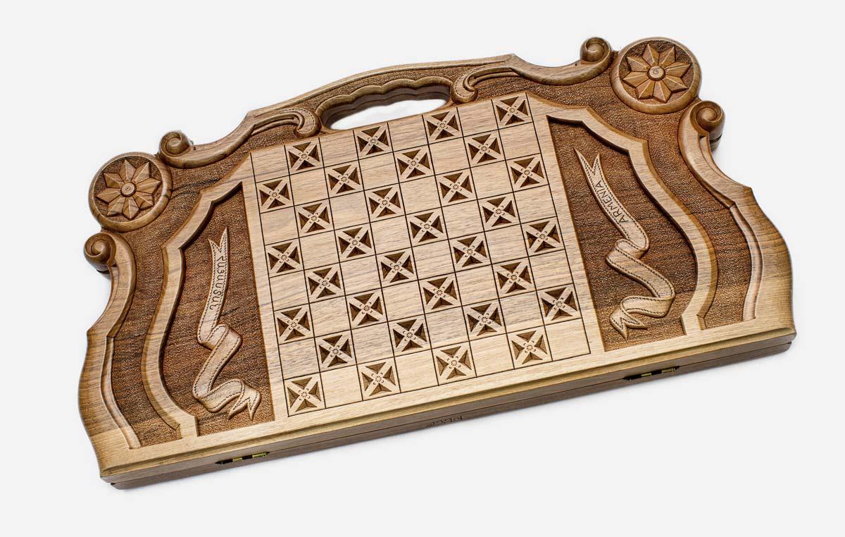 Angled view of the ornate Mount Ararat master walnut backgammon board