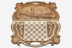 Detail of the ornate carved frame