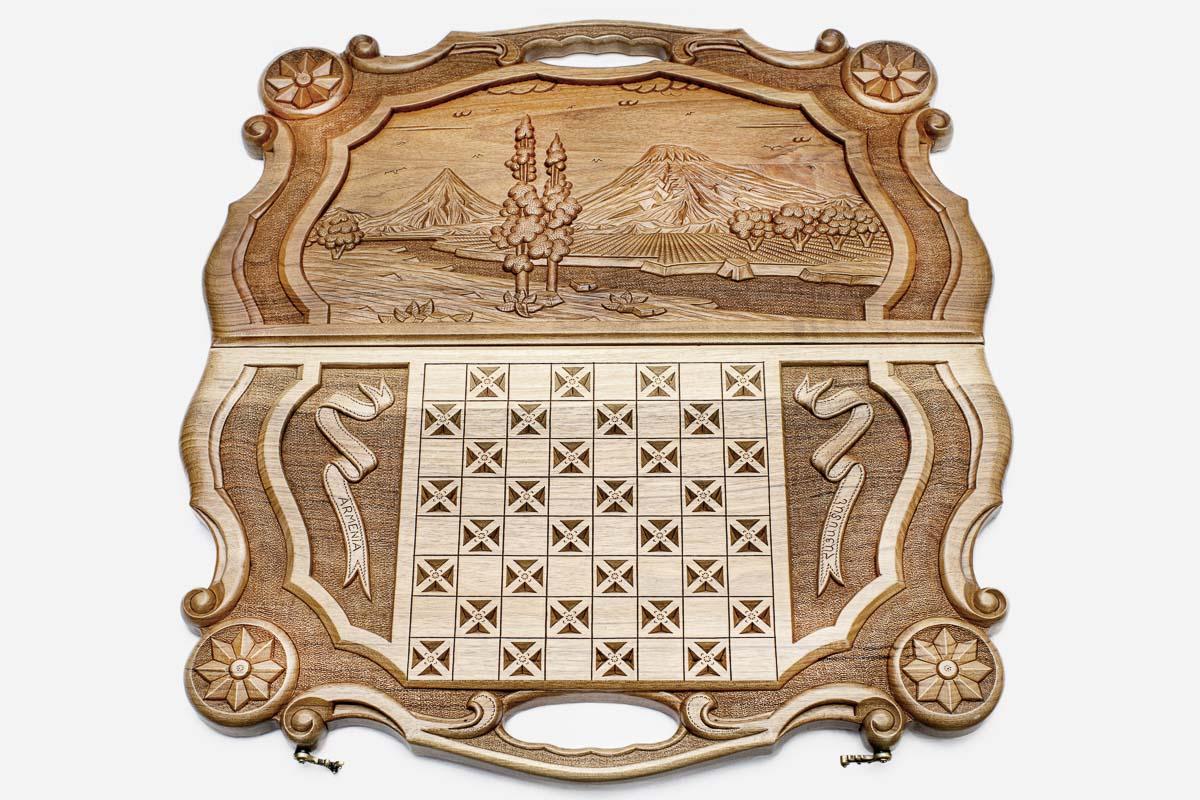 Detail of the ornate carved frame