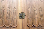 The backgammon board opened to show the wooden playing surface