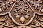 Detail of the carved fan at the base