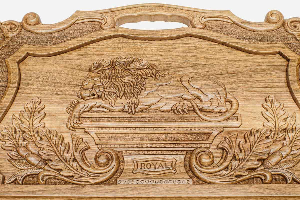 The backgammon board opened to show the wooden playing surface