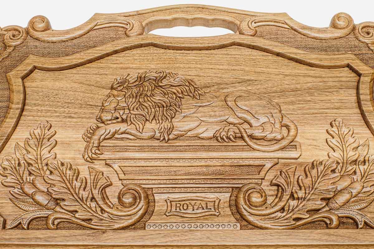 The backgammon board opened to show the wooden playing surface