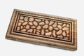Master-carved walnut backgammon board resembling a bed of river stones, propped open