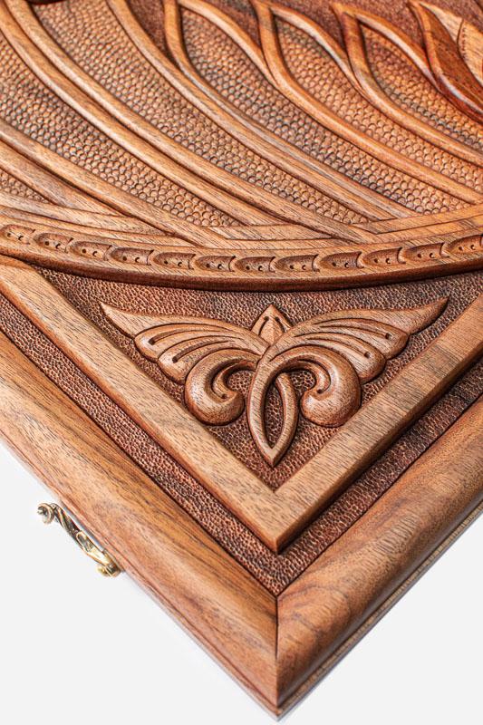 Side view of the folded board with its carry handle
