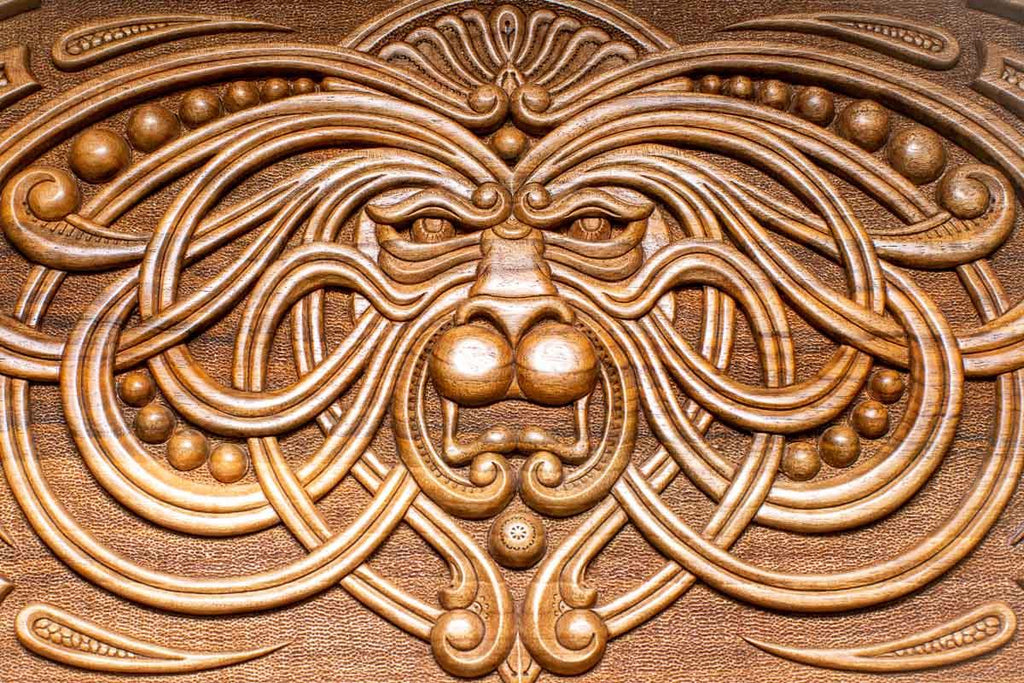 The backgammon board opened to show the wooden playing surface