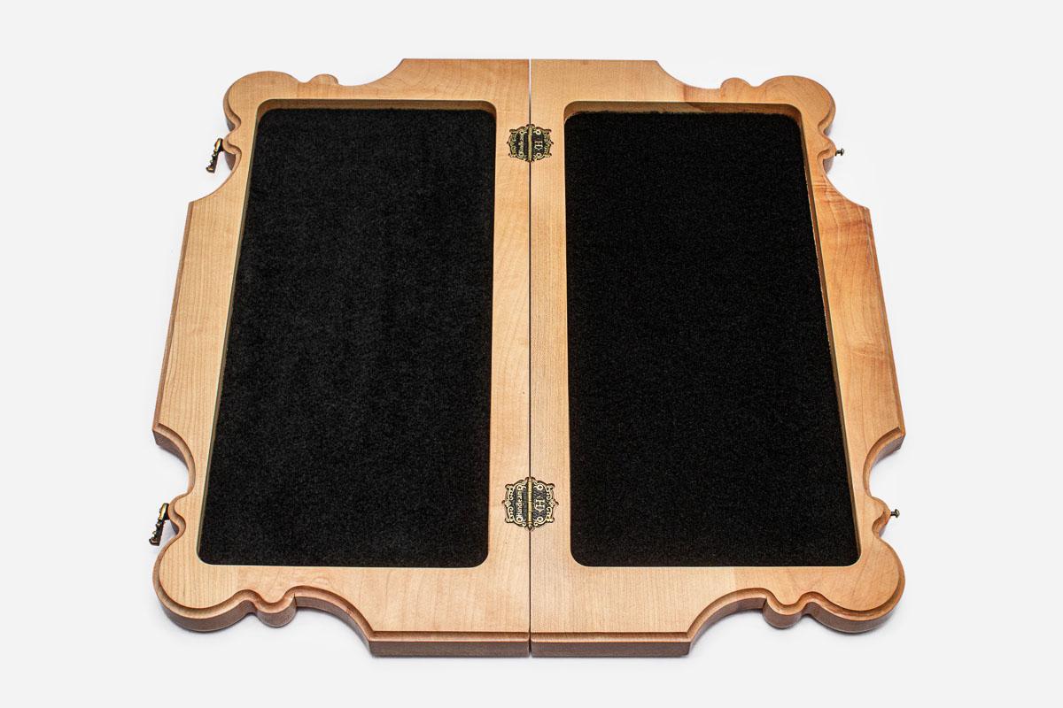 Overhead view of the full set of 32 pieces on the maple and walnut playing field